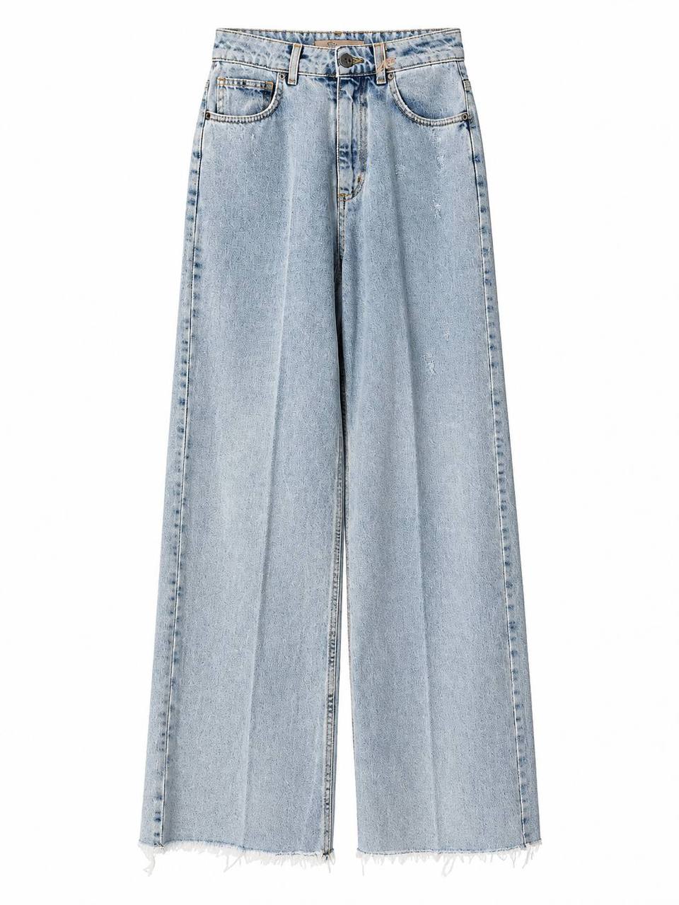 Jeans con frange