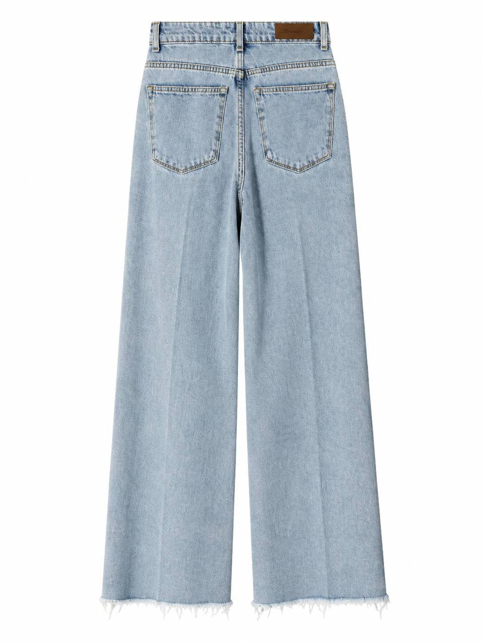 Jeans con frange