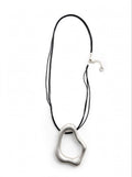 Accessorio asimmetrico