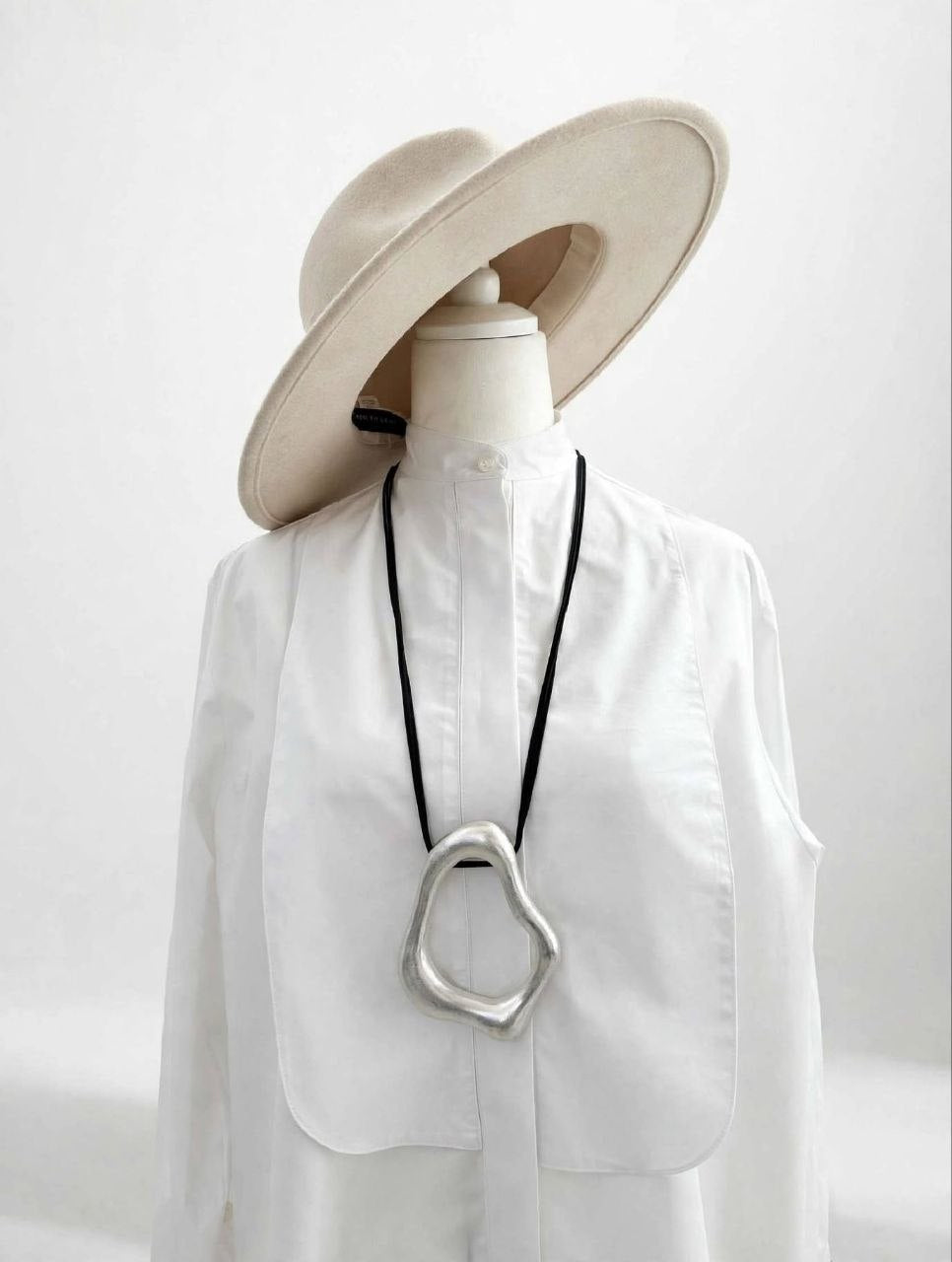 Accessorio asimmetrico
