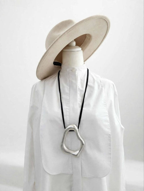 Accessorio asimmetrico